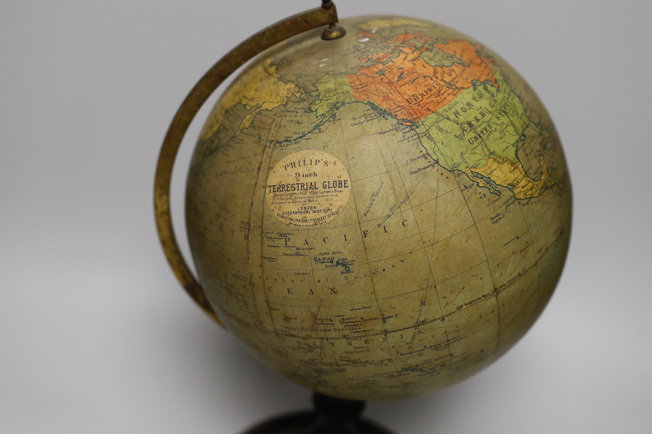 An Edwardian Philip’s 9 inch terrestrial globe, printed in Great Britain by George Philip and Son, 42cms high